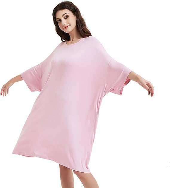 Oversized baby pink sleep tee made from heat-regulating bamboo, featuring two side pockets.