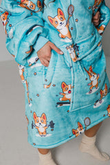 SNUGLFIT™ Hoodie Blanket with Sporty Corgi print, plush Sherpa fleece interior, oversized design, and extra-large pocket for comfort and convenience.