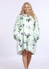 SNUGLFIT™ Hoodie Blanket - Panda design worn by a person, showing oversized comfort and style.