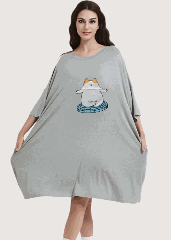 Snuglfit™ Oversized Zen Cat Sleep Tee in gray with cat design, featuring soft bamboo fabric and handy side pockets.