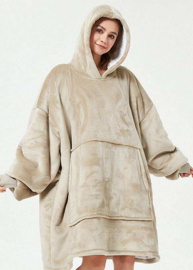 SNUGLFIT™ Hoodie Blanket in Khaki worn by a woman, showcasing oversized comfort and plush Sherpa fleece.