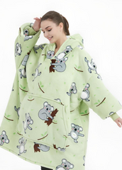 Cozy oversized hoodie blanket with koala design, featuring plush Sherpa fleece and flannel exterior for warmth and comfort.