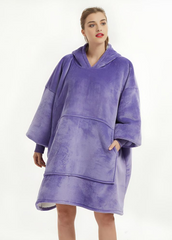 Oversized purple wearable blanket hoodie with roomy fit and soft fleece material.