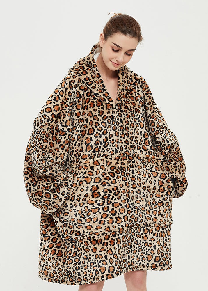 Leopard print SNUGLFIT™ hoodie blanket for cozy comfort.