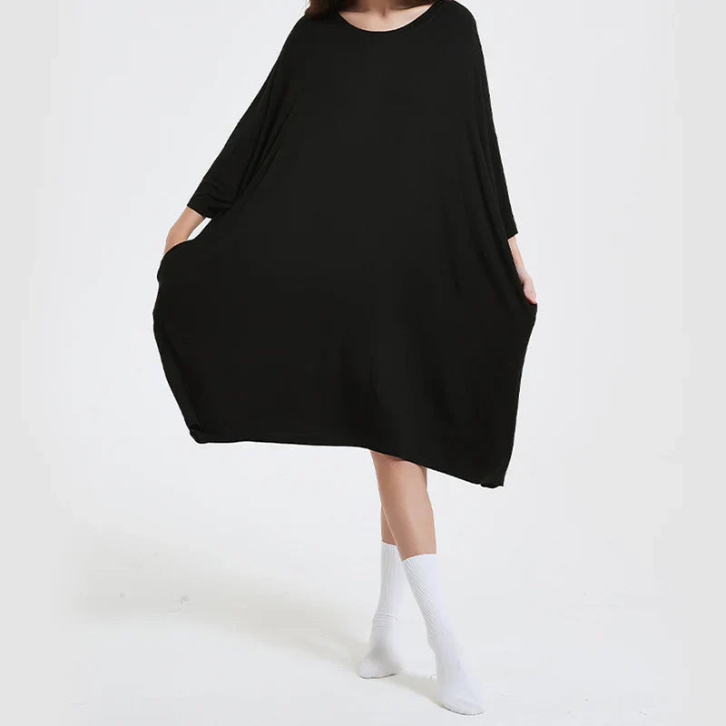 Oversized black bamboo sleep tee with pockets, Snuglfit™ super soft and moisture-wicking.