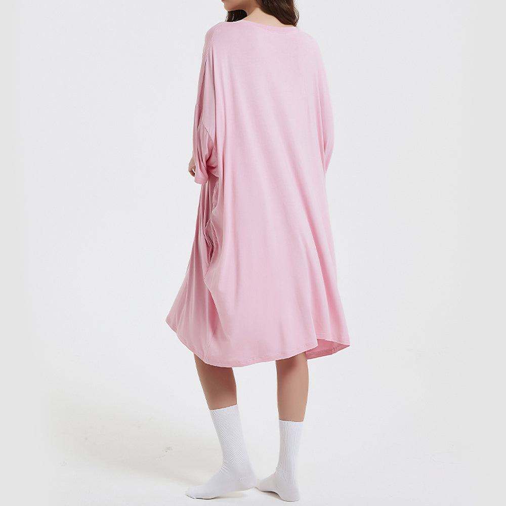 Snuglfit™ super soft oversized baby pink sleep tee with side pockets, heat-regulating bamboo fabric.