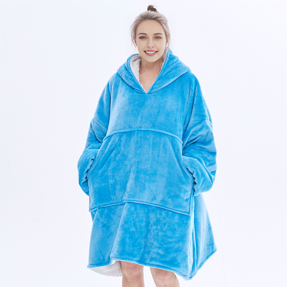 SNUGLFIT™ Hoodie Blanket in turquoise blue worn by a person, showcasing oversized comfort and plush warmth.