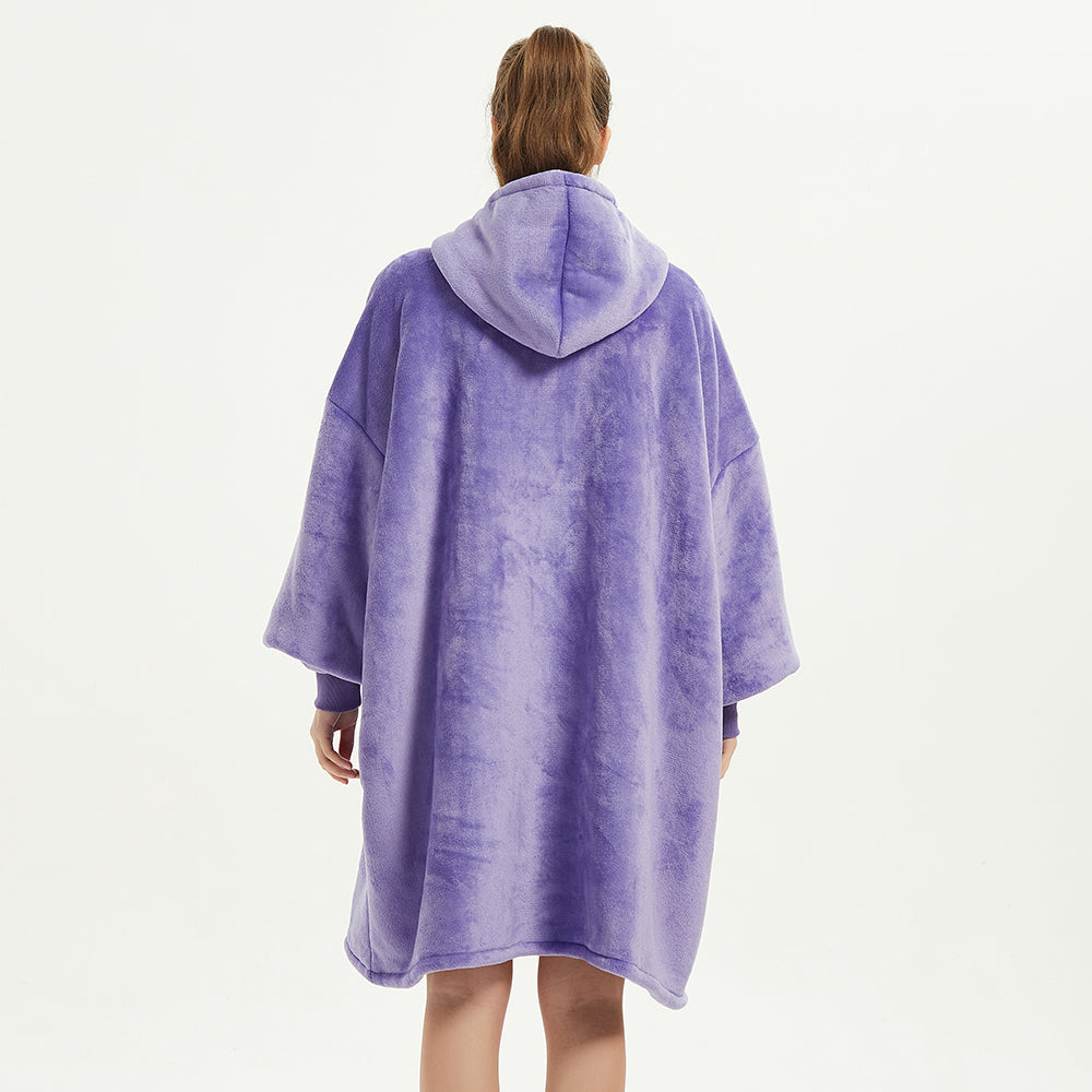 Oversized wearable blanket SnuglFit™ hoodie in purple, offering luxurious Sherpa fleece comfort and warmth.