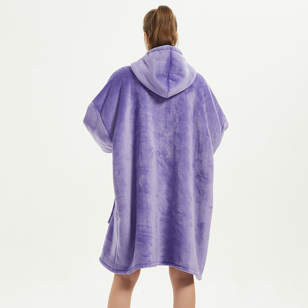 Oversized wearable blanket in plush purple fleece, SnuglFit™ Hoodie Blanket for comfort and warmth.