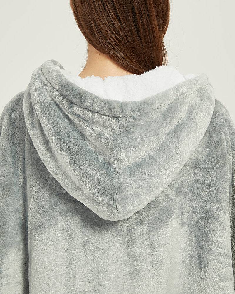 Light grey SNUGLFIT™ hoodie blanket with plush Sherpa fleece interior.