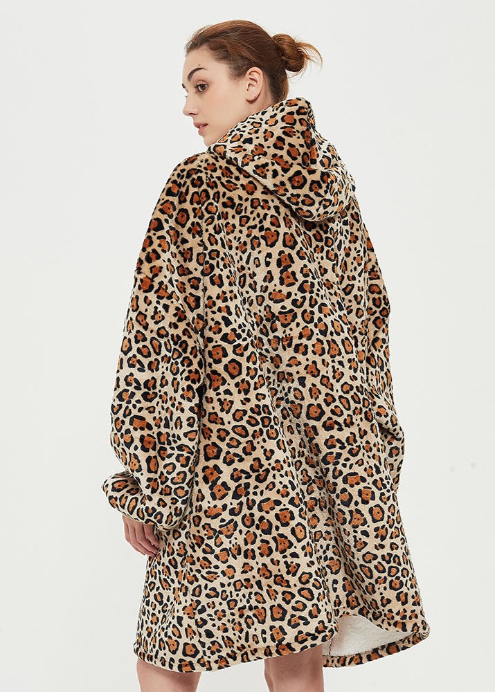 Leopard print SNUGLFIT™ hoodie blanket offering warmth and style.