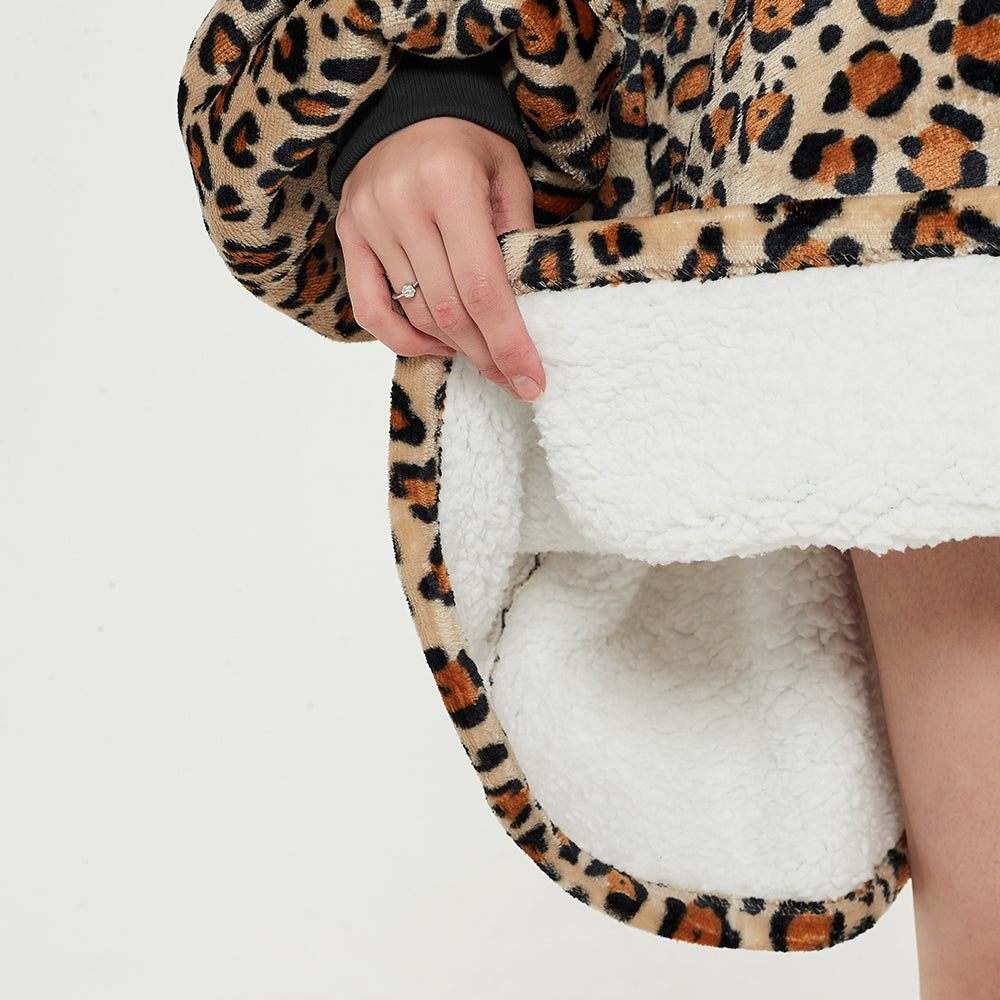 SNUGLFIT™ Hoodie Blanket - Leopard Print, plush Sherpa fleece interior, cozy wearable blanket.