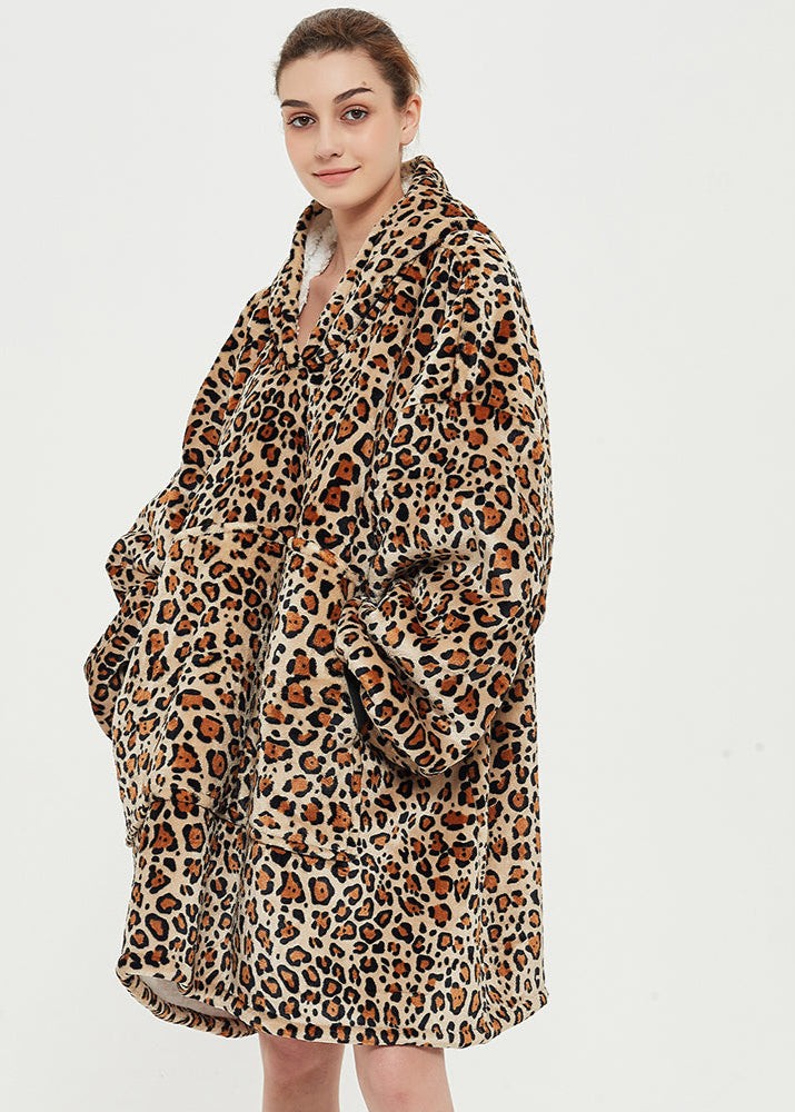 Leopard print SNUGLFIT™ Hoodie Blanket with plush Sherpa fleece interior.
