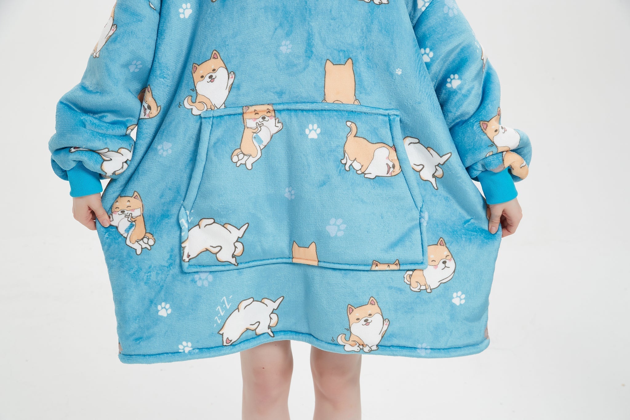 SNUGLFIT™ Hoodie Blanket with Shi Bu Inu Dogs print on plush blue fleece, featuring an oversized fit and extra-large pocket for comfort and convenience.