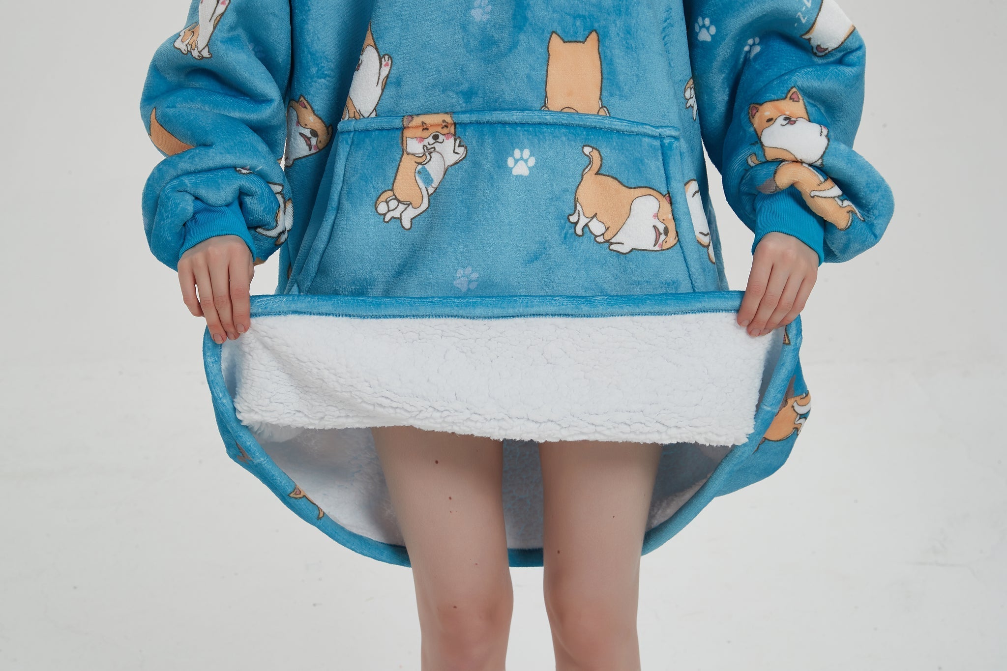 SNUGLFIT™ Hoodie Blanket featuring Shiba Inu dogs, plush Sherpa fleece interior, in blue.