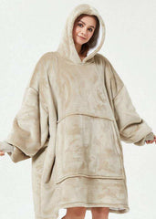 SNUGLFIT™ Hoodie Blanket in Khaki worn by a woman, showcasing oversized comfort and plush Sherpa fleece.