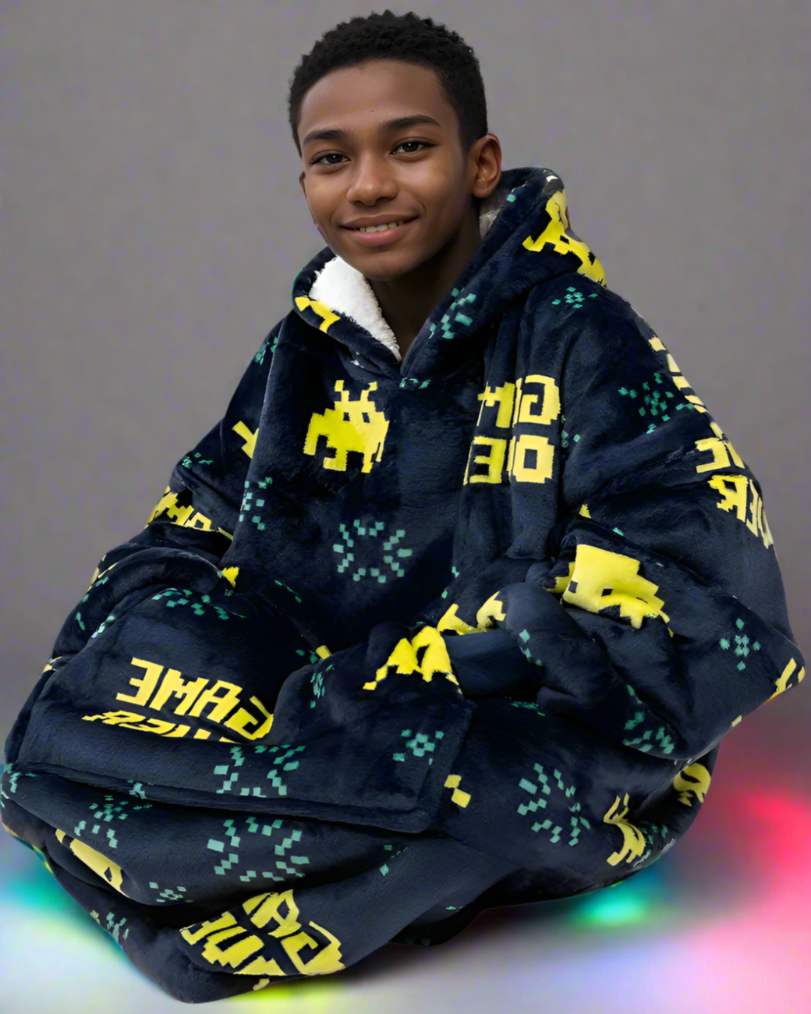 SNUGLFIT™ Hoodie Blanket Kids - Gamer design featuring a cozy, oversized fit with video game print for children aged 4-13.