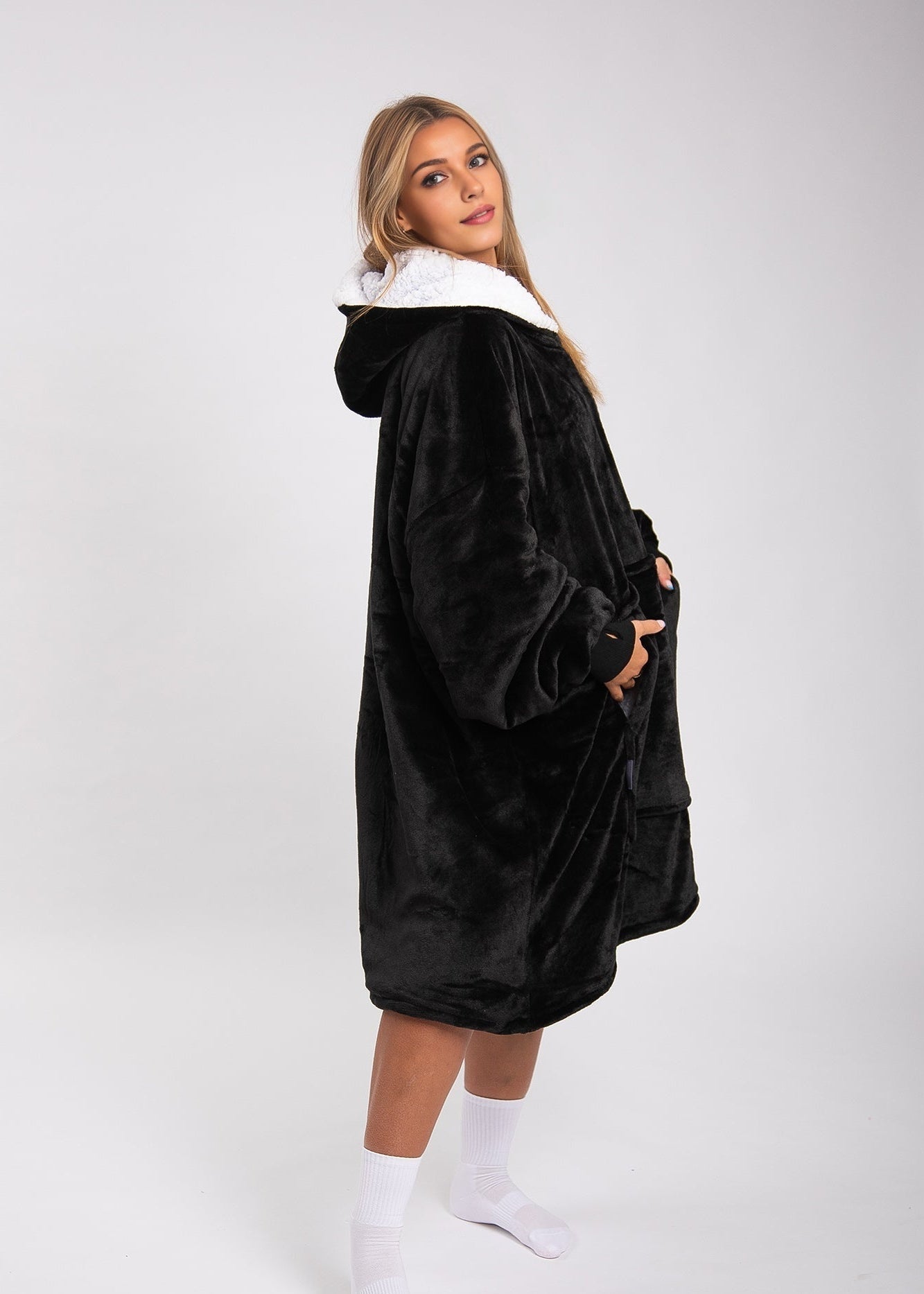 SNUGLFIT™ Hoodie Blanket in Midnight Black - cozy, oversized wearable blanket with plush Sherpa fleece interior.