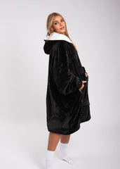 SNUGLFIT™ Hoodie Blanket in Midnight Black - cozy, oversized wearable blanket with plush Sherpa fleece interior.