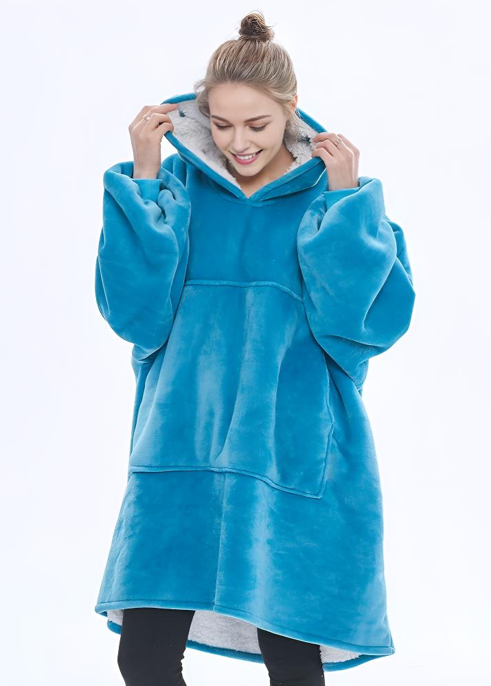 Sky blue SNUGLFIT™ hoodie blanket showcasing plush warmth and style.