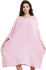 Oversized baby pink sleep tee, ultra-soft bamboo fabric, with side pockets.