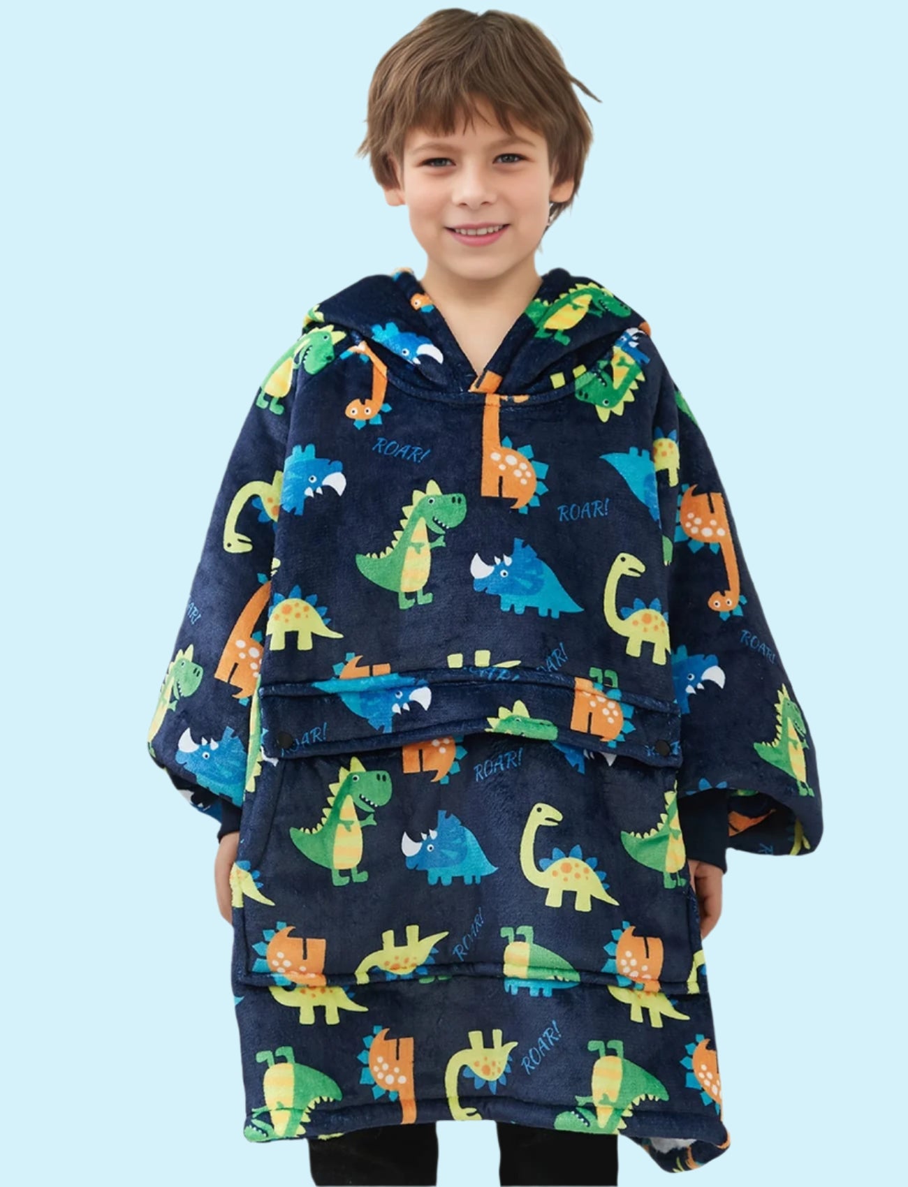Kids wearing SNUGLFIT™ Hoodie Blanket with dino print, cozy and oversized fit.